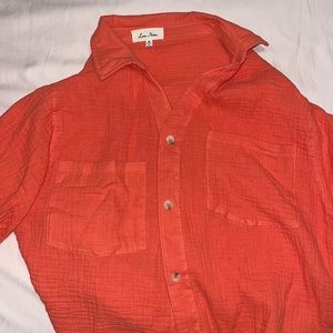 beautiful orange cropped button up shirt, never worn